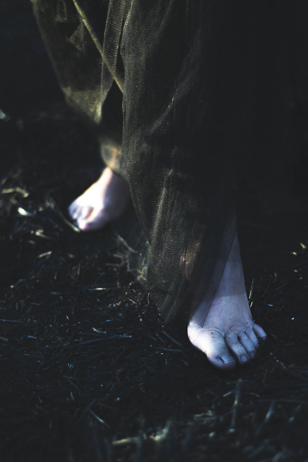 Dark footsteps, staged photograph